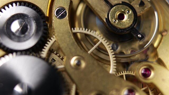 working clockwork gears (clock mechanism) inside a vintage clock