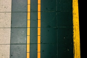 Full Frame Shot Of Yellow Stripes At Underground Station