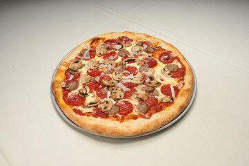Delicious Pepperoni Sausage Mushroom Onion Pizza