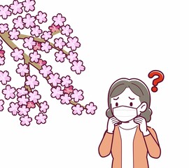 マスクをしたまま花見をする人