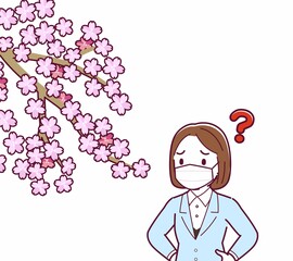 マスクをしたまま花見をする人