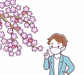 マスクをしたまま花見をする人