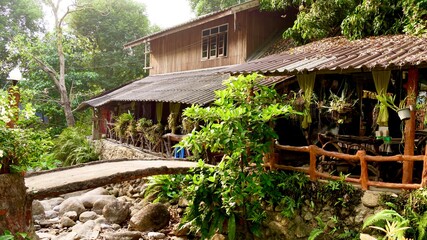 March 18 2021 - Ratchaburi, Thailand : Wooden house near  small creek in countryside, Thailand.
