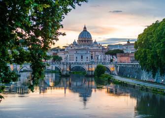 view of the vatican on the tiber in a very beautiful sunset light