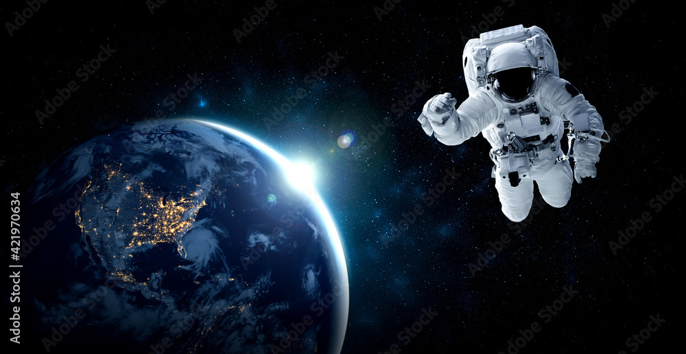 Canvas Prints astronaut spaceman do spacewalk while working for space station in outer space . astronaut wear full
