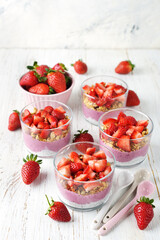 Dessert with chia pudding, granola and strawberries