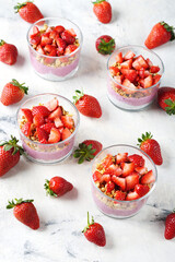 Dessert with chia pudding, granola and strawberries
