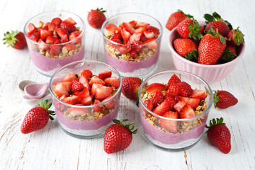 Dessert with chia pudding, granola and strawberries
