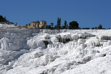 The incredible travertines, otherwise known as Cotton Castle at Pamukkale, Turkey. The travertines...
