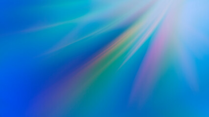 Abstract blue background with rainbow rays