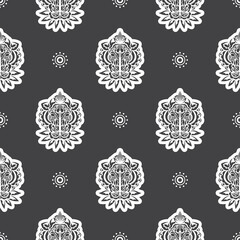 Seamless pattern with a lion's head in a simple style. Good for backgrounds, prints, apparel and textiles. Vector illustration.