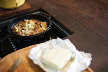 fried potatoes roasting in frying pan