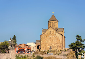 Fototapeta na wymiar Tbilisi, Georgia - August 20, 2020: Temple on Metekhi rock