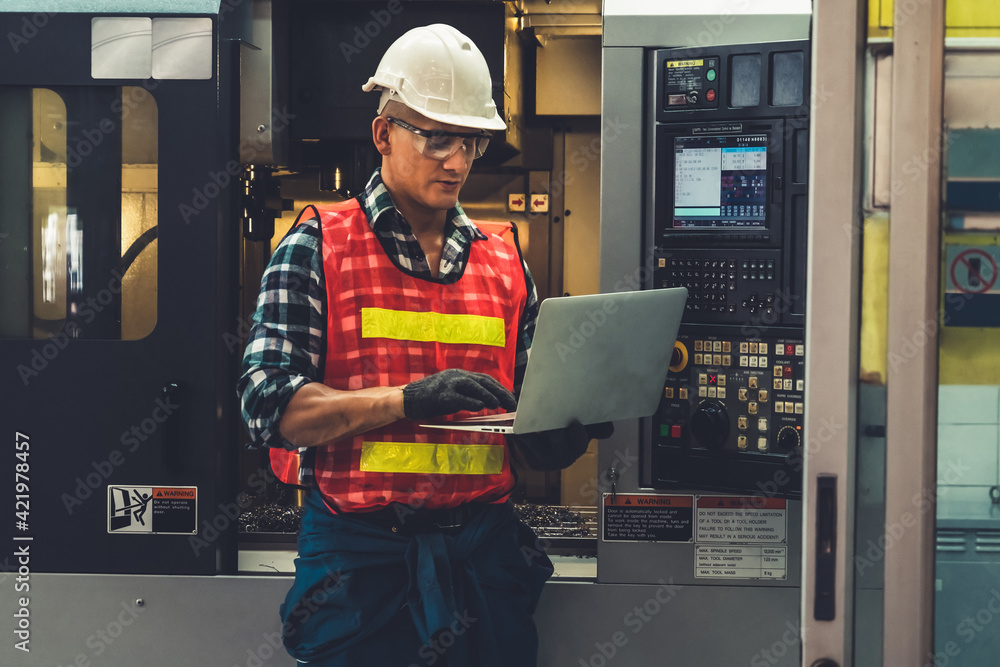 Poster smart factory worker or engineer do machine job in a manufacturing workshop . industry and engineeri
