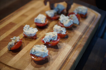 tomatoes with farmer paneer cottage cheese. vegetarian meal appetizer.