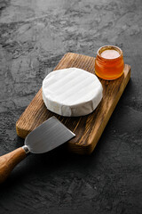 Piece of soft brie or camembert cheese