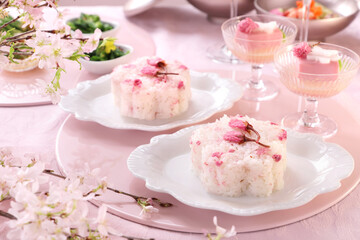 Cherry blossom shaped salted cherry blossom rice on white plate. さくら型さくらご飯　おうちでお花見　