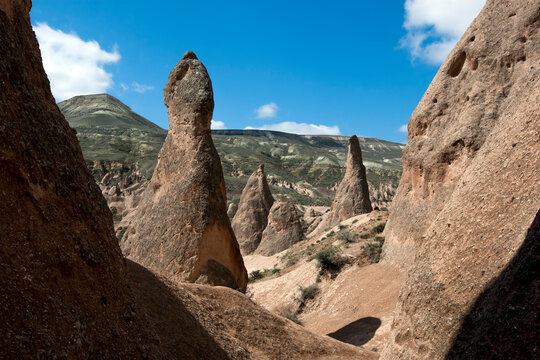 A view showing volcanic rock formations known as fairy chimneys at the Devrent Valley in the Cappadocia region of Turkey.