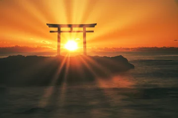 Poster Im Rahmen 大洗海岸に立つ神磯の鳥居に差し込む太陽光線 © san724