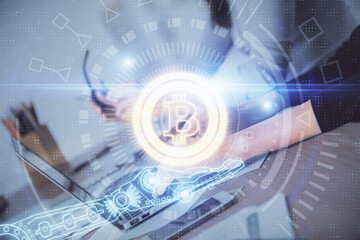 Double exposure of woman hands typing on computer and crypto market theme hologram drawing. Blockchain concept.
