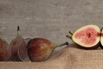 Close up of delicious figs on jute