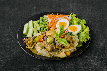 Rice noodles with chicken green curry Thai cuisine