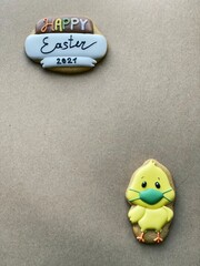 Funny Easter yellow chick in a face protective mask 