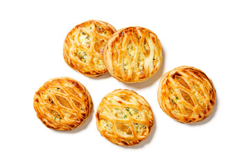 Spinach and ricotta stuffed puff pastry mini pies. isolated on white background