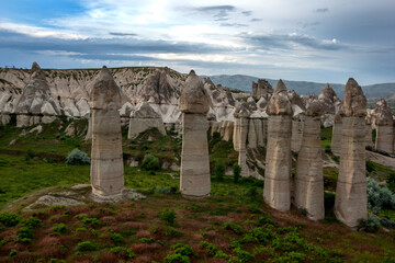 A series of volcanic rock formations known as fairy chimneys in Love Valley at Goreme in the Cappadocia region of Turkey.