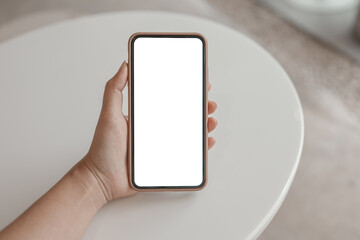 Women's hands holding cell telephone blank copy space screen. smart phone with technology concept