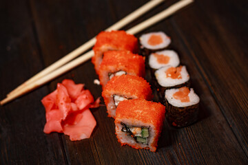 set sushi rolls delicacy wooden sticks top view japanese cuisine