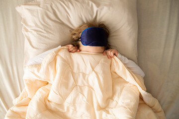 The baby woke up and did not want to get out of bed, threw a blanket over her head. Hiding from my...