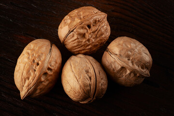 walnuts on a wooden surface