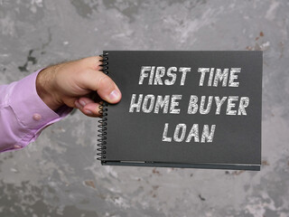 Financial concept meaning FIRST TIME HOME BUYER LOAN with phrase on the sheet.
