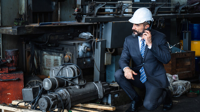 Engineering Engine Machine Controller Manager Control Concept, Technical Engineer Checking, Working And Talking On Radio Communication To Tell Worker Working In Industry