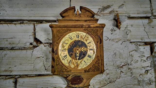 vintage clock on a brick wall