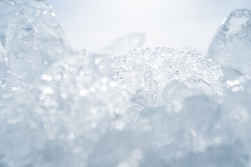 Stacks of drift ice piled up against the dutch coast with crystal clear sunlight