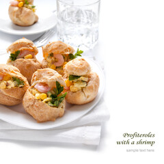 Shrimp Salad Profiterole. Profiteroles with a salad with shrimp on the white