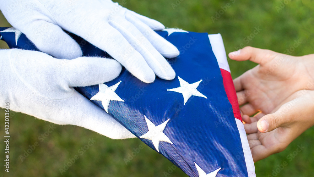 Wall mural ceremony of a giving a folded flag - triangle flag