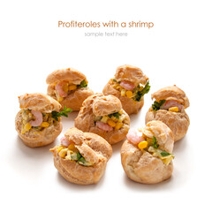 Shrimp Salad Profiterole. Profiteroles with a salad with shrimp on the white