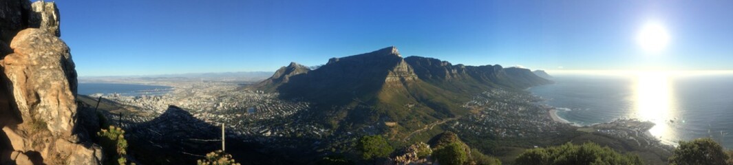 sunset over Camps bay overlooking table mountain in cape town