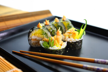 colorful and interesting sushi rolls served in an appetizing way