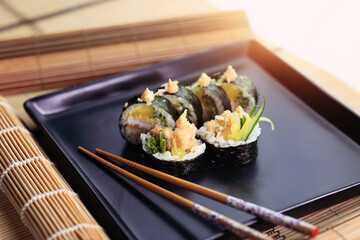 colorful and interesting sushi rolls served in an appetizing way