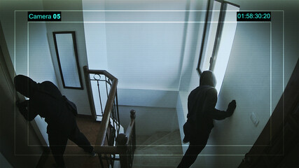 Unknown male robbers entered the house, CCTV recording.