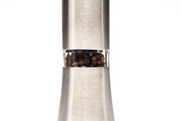 metal spice grinder on a white background