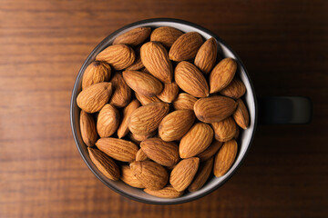 Brown almond in a coffee mug.