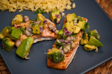 Fried salmon with avocado and rice