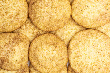 background of snickerdoodle cookies with sugar and cinnamon