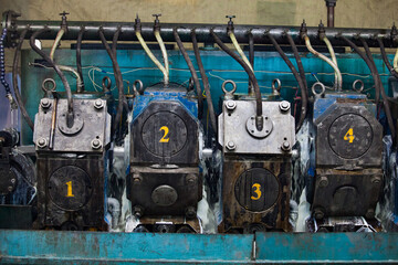 Closeup of aluminium wire rod production machine.