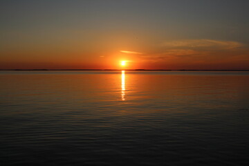 colorful sunset at sunset in the ocean horizon of the sea